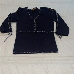 Georgiou 3/4 sleeve blouse with lace up on sleeves and front